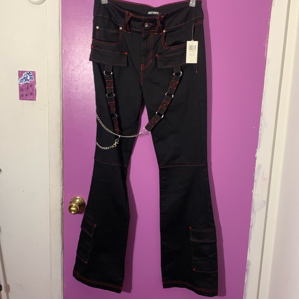 these are red and black bell bottom jeans